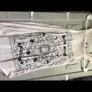 Tan tank top with sun patterns